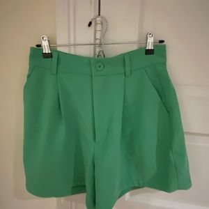 Danielle Bernstein / We Wore What green trouser shorts